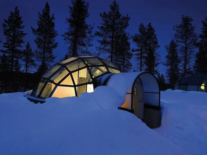 A night in a Glass Igloo under the starry sky and northern lights display (image from Hotel Kakslauttanen)