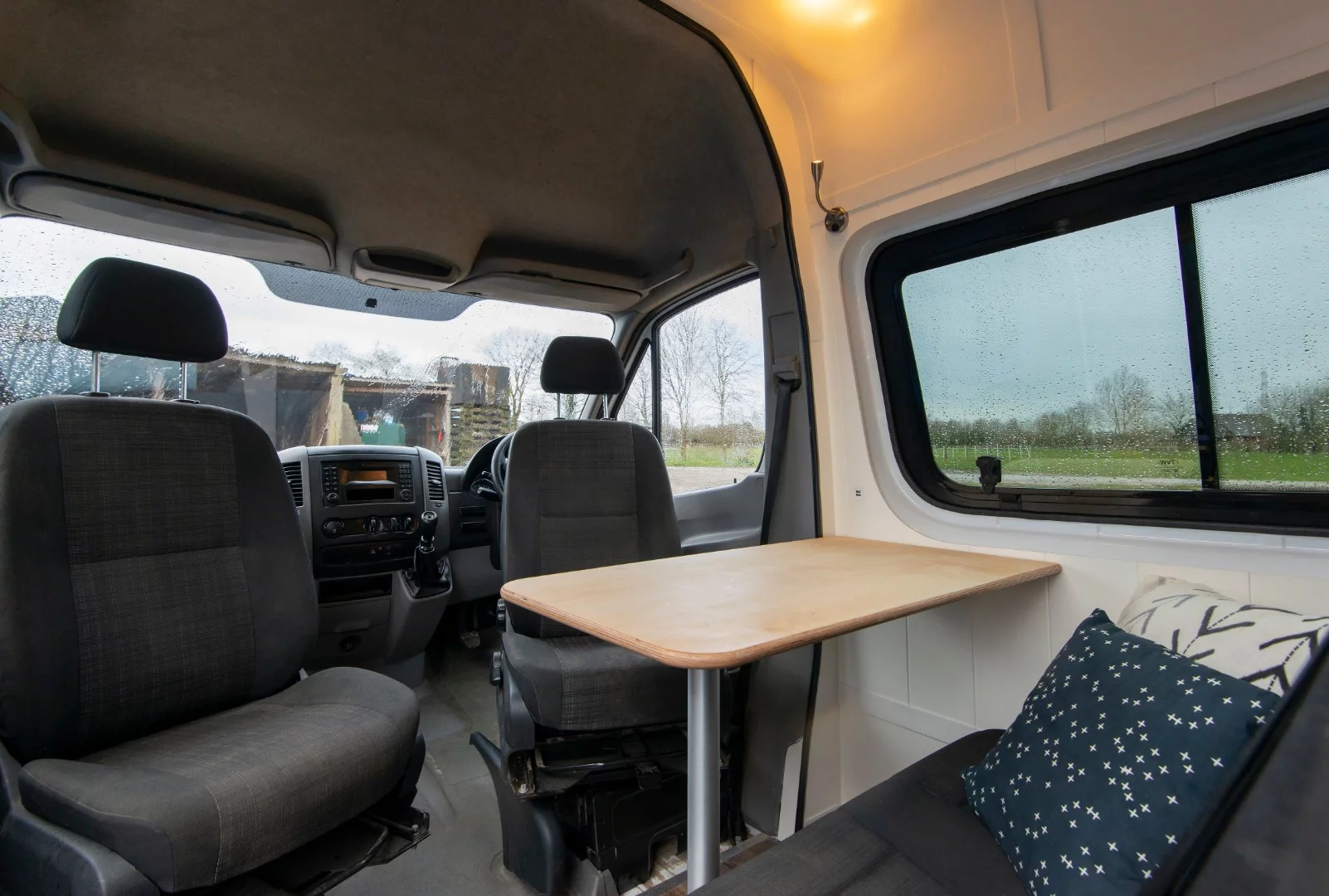Front seats of the van swivel 180 degrees to face the passenger seats