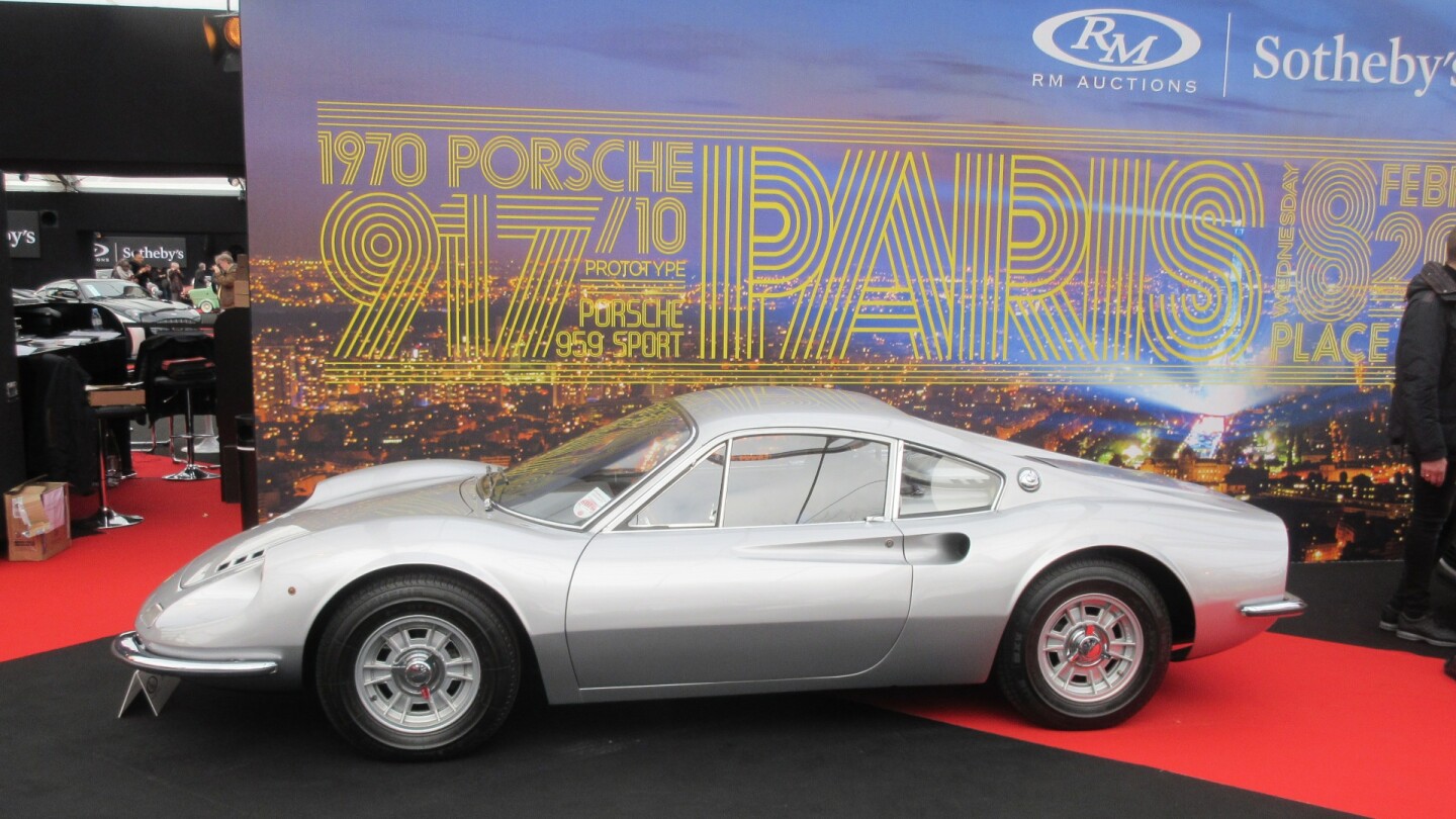 This 1968 Ferrari Dino 206 GT by Scaglietti is one of 154 aluminum-bodied Dino 206s produced. Finished in its original colors of Argento Auteuil Metallizzato over Nero with blue cloth inserts, the car is Ferrari Classiche certified.