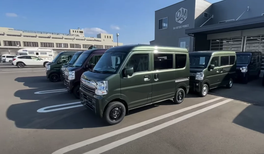 Suzuki Every kei vans await conversion at Oka Motors shop