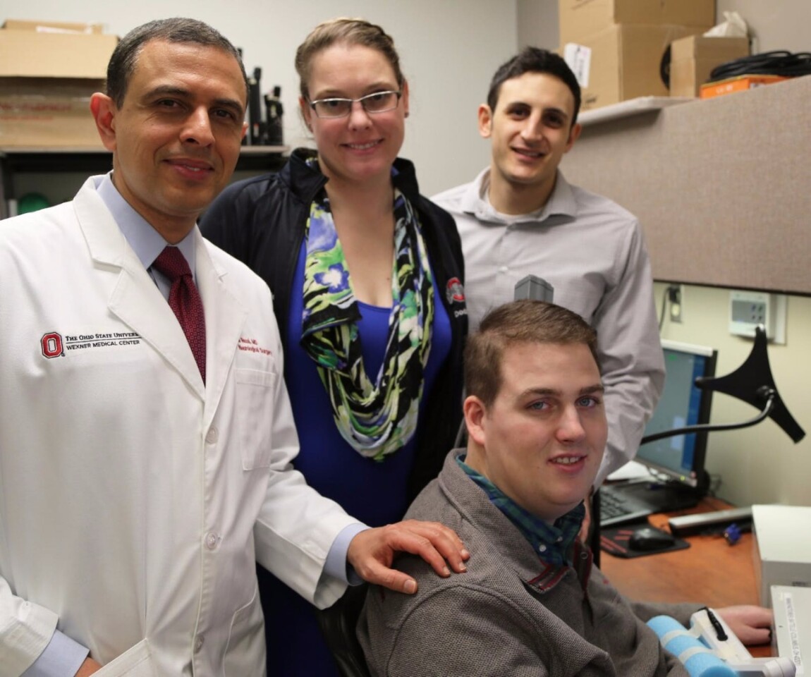 Dr Ali Rezai (left) with his patient Ian Burkhart