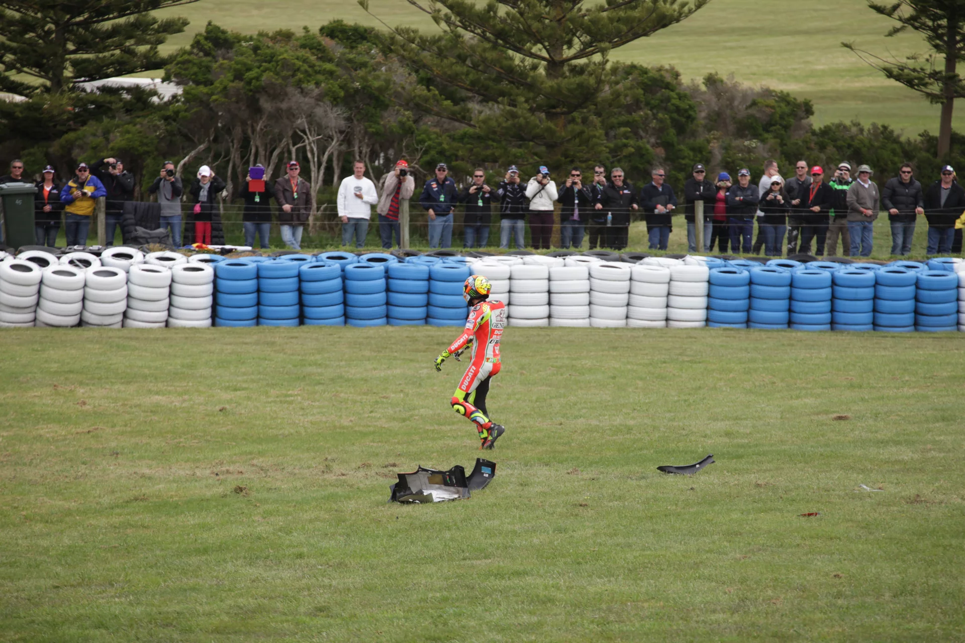 Rossi sends his motorcycle down the road during warm up practice