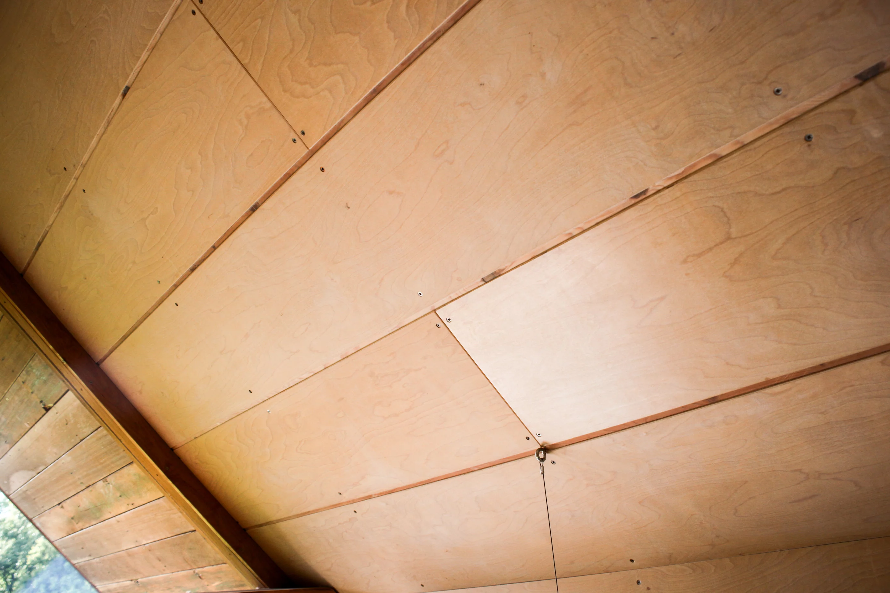 Maret hand-built the home by using primarily salvaged and raw materials.