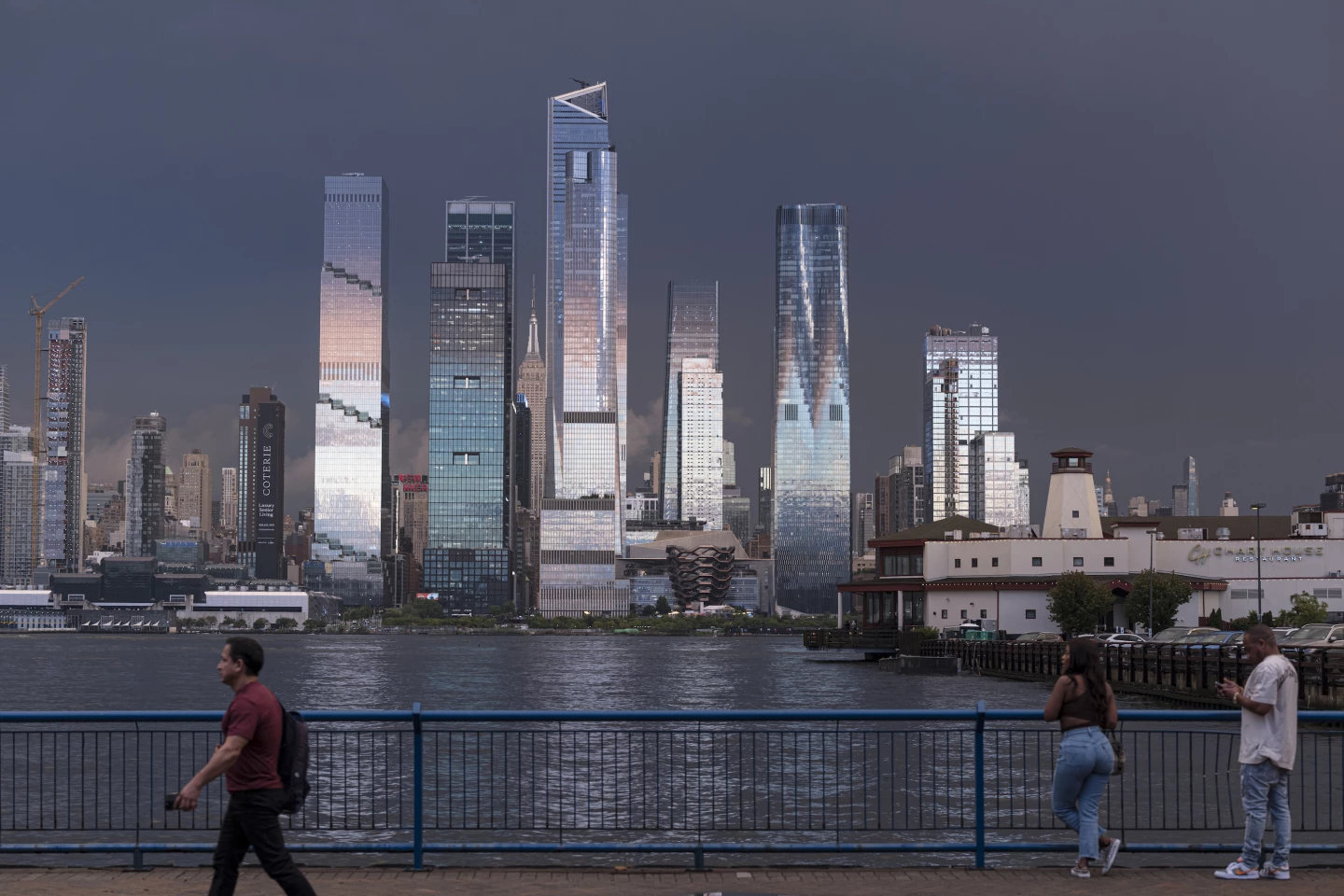 The Spiral, by BIG, is part of the Hudson Yards mega-development which also includes Heatherwick Studio's Vessel and KPF's 30 Hudson Yards, both of which are visible above