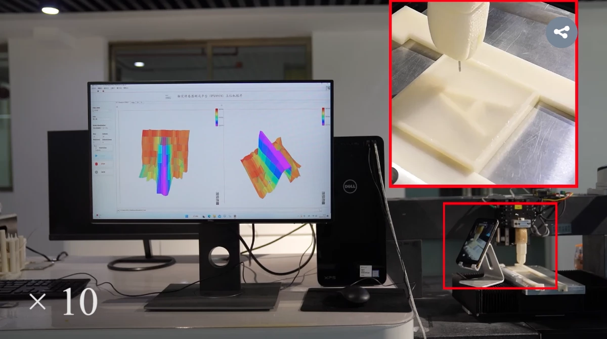 Image showing inset of bionic finger with computer screens showing 3d models