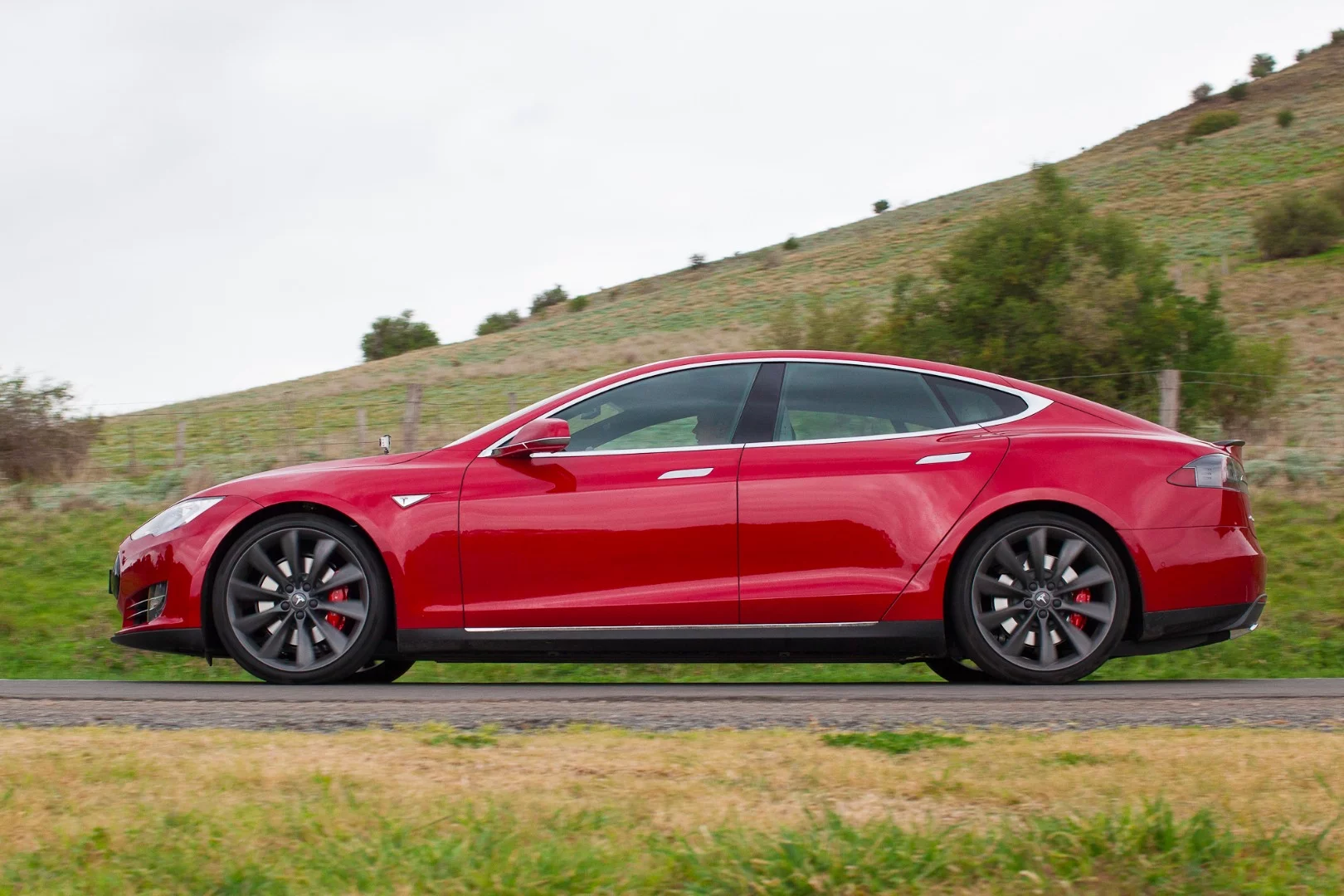 Red brake calipers are one hint to the Model S' potential