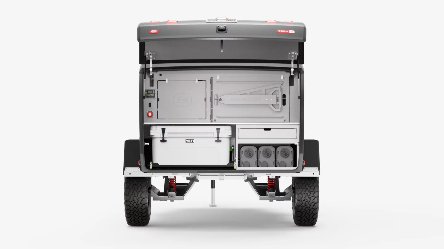 The Escapod Nomad features a simpler build without any of the inset appliances or hard plumbing of the Voyager model we tested. It can be optionally upgraded with add-ons like the Yeti cooler and Dometic water jugs pictured