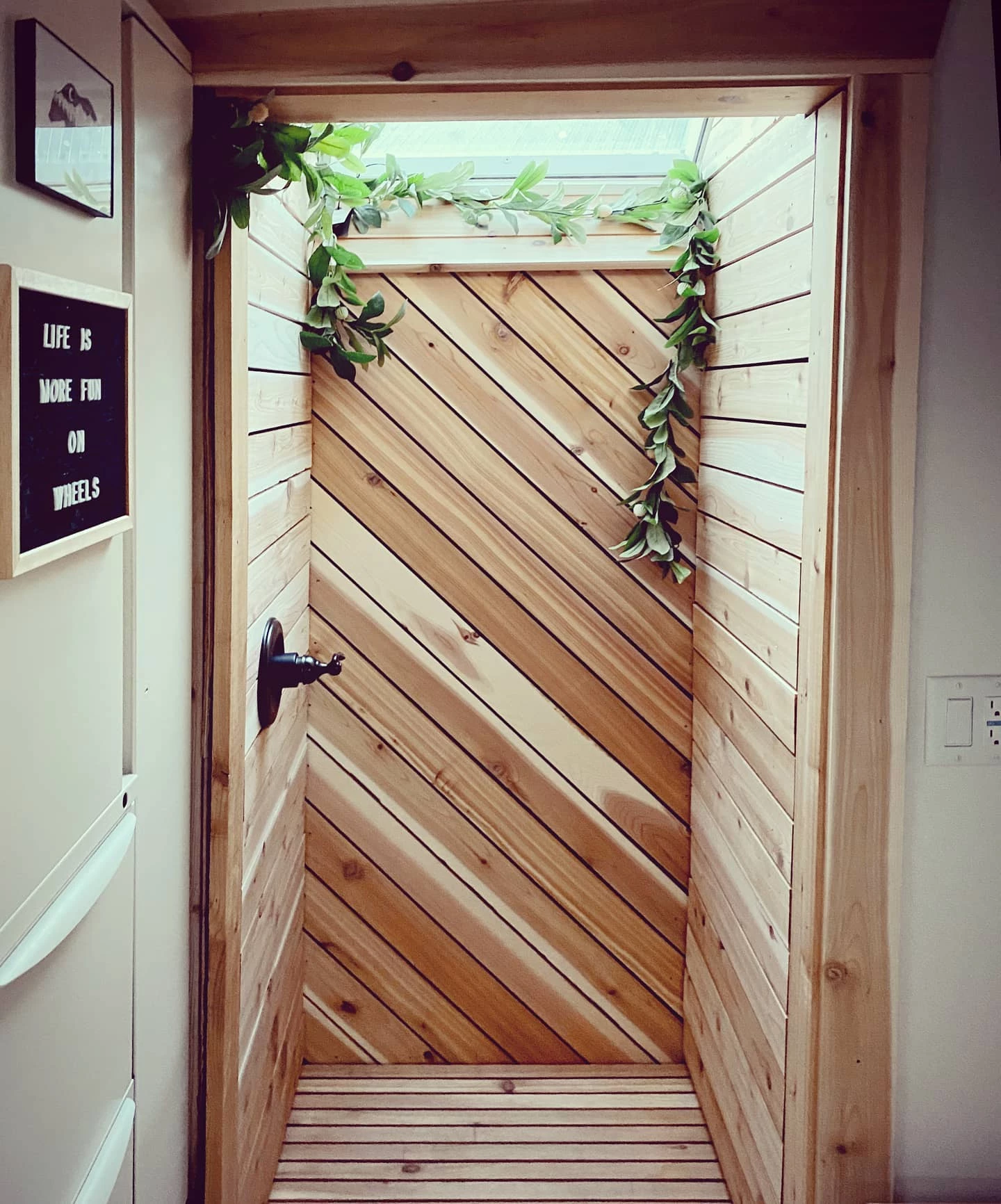 Cedar glass roof shower makes you feel like you're showering outdoors
