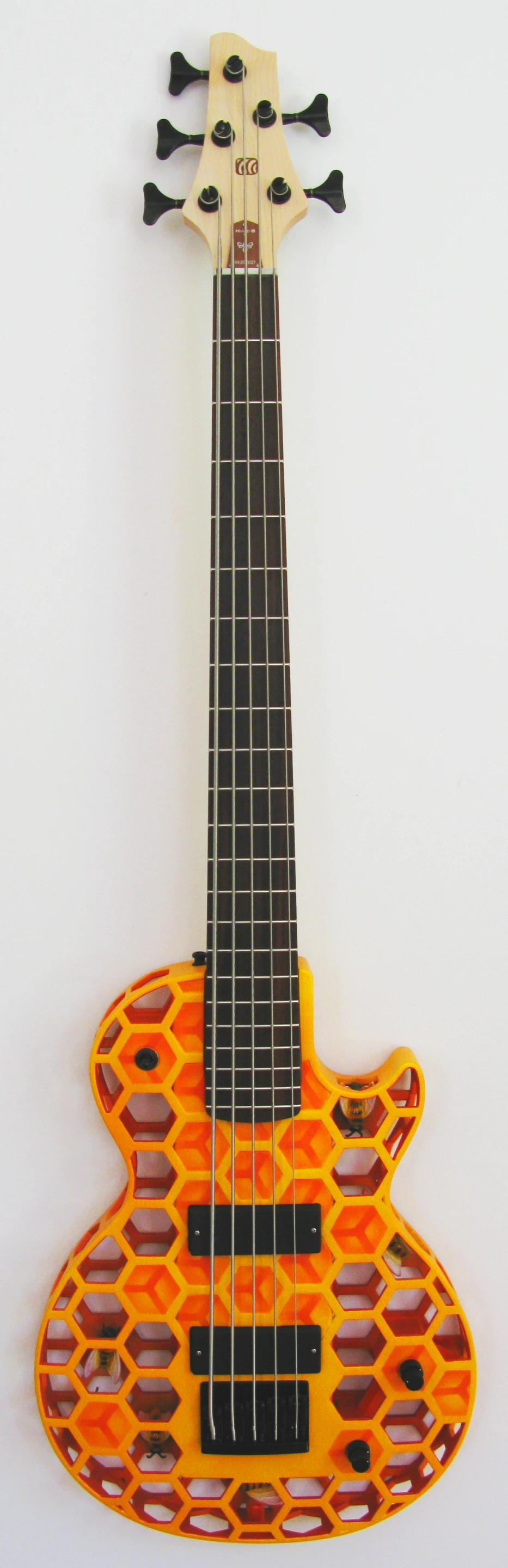 An airbrushed 5-string version of the Hive B bass guitar from ODD Guitars
