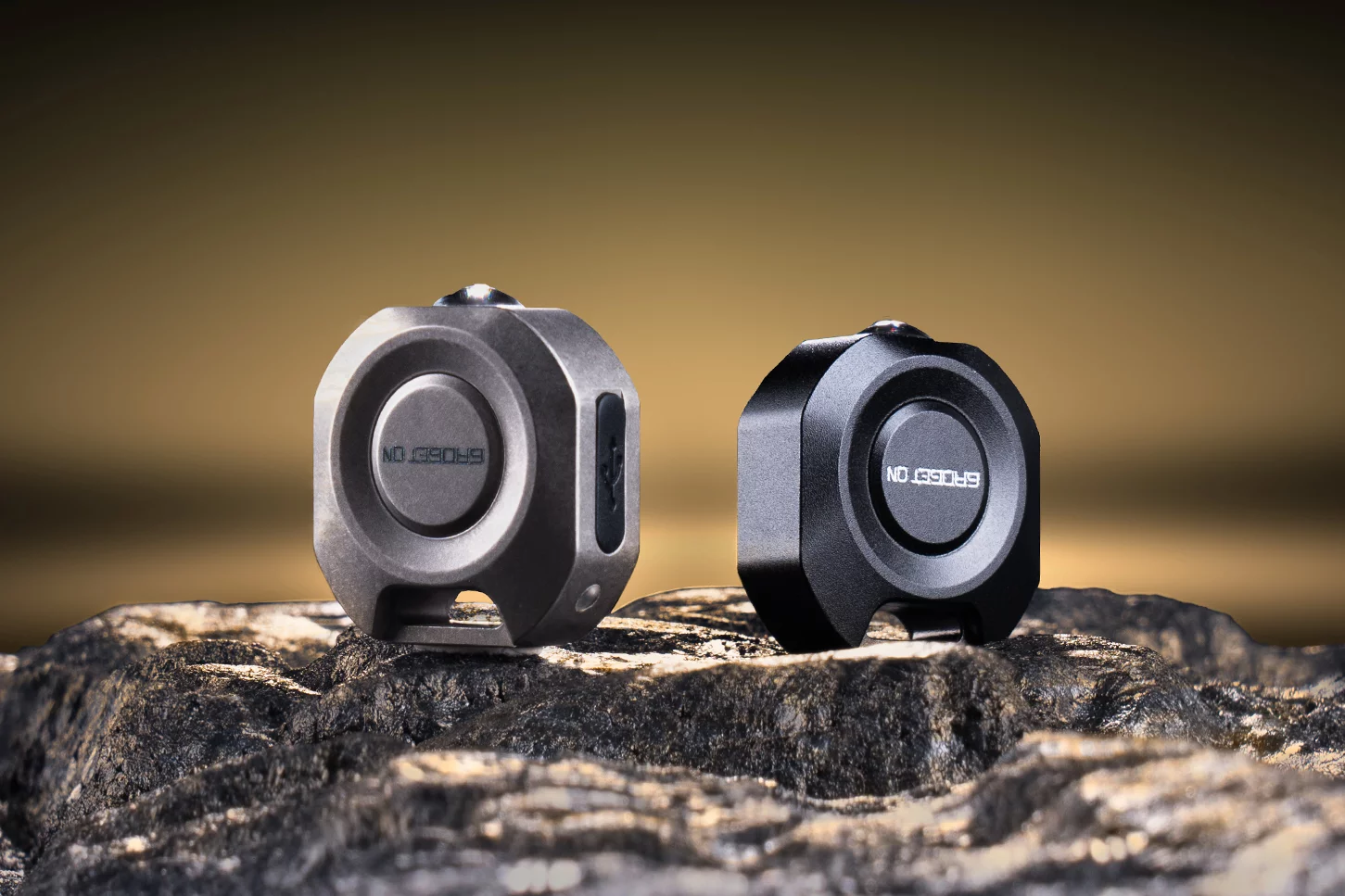 The NanoB9 is being offered in stonewashed titanium (left) or black-anodized aluminum (right)