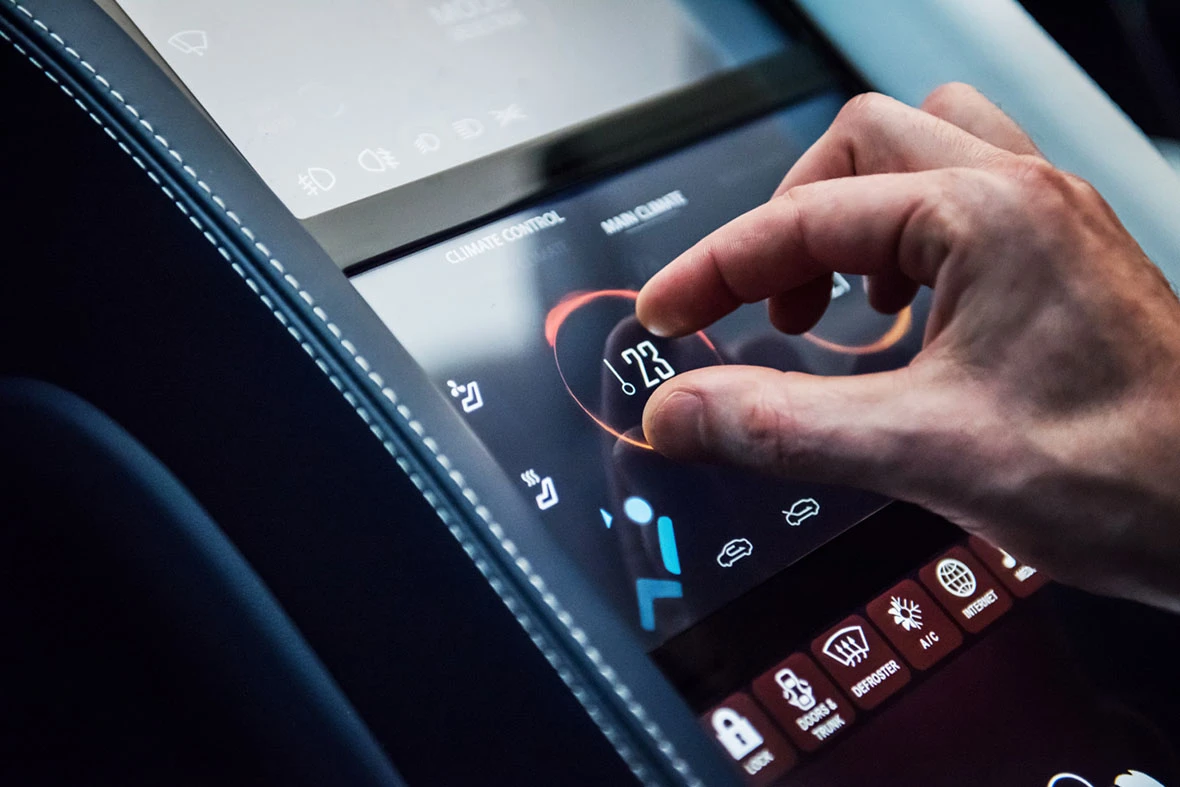 The interior features a center tunnel touch control center for cabin settings
