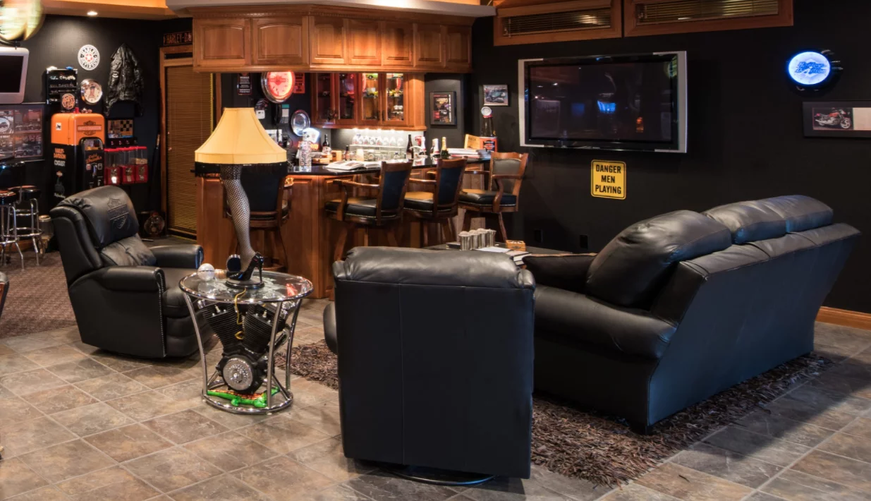 The Harley-Davidson leather couch and two chairs above fetched $7,700 and the Harley engine coffee table fetched $1,250.