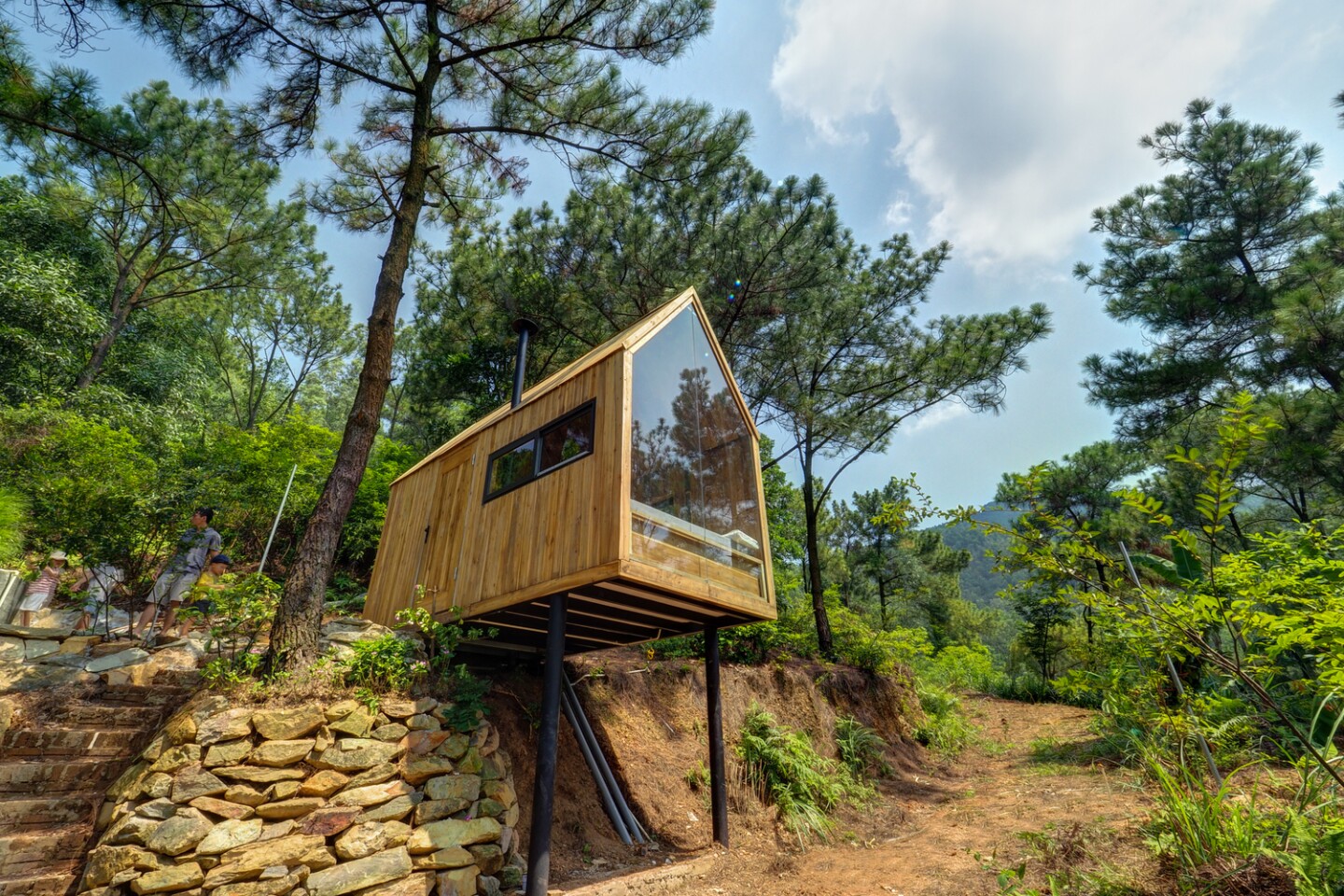 Vietnamese Forest House puts tiny living on stilts