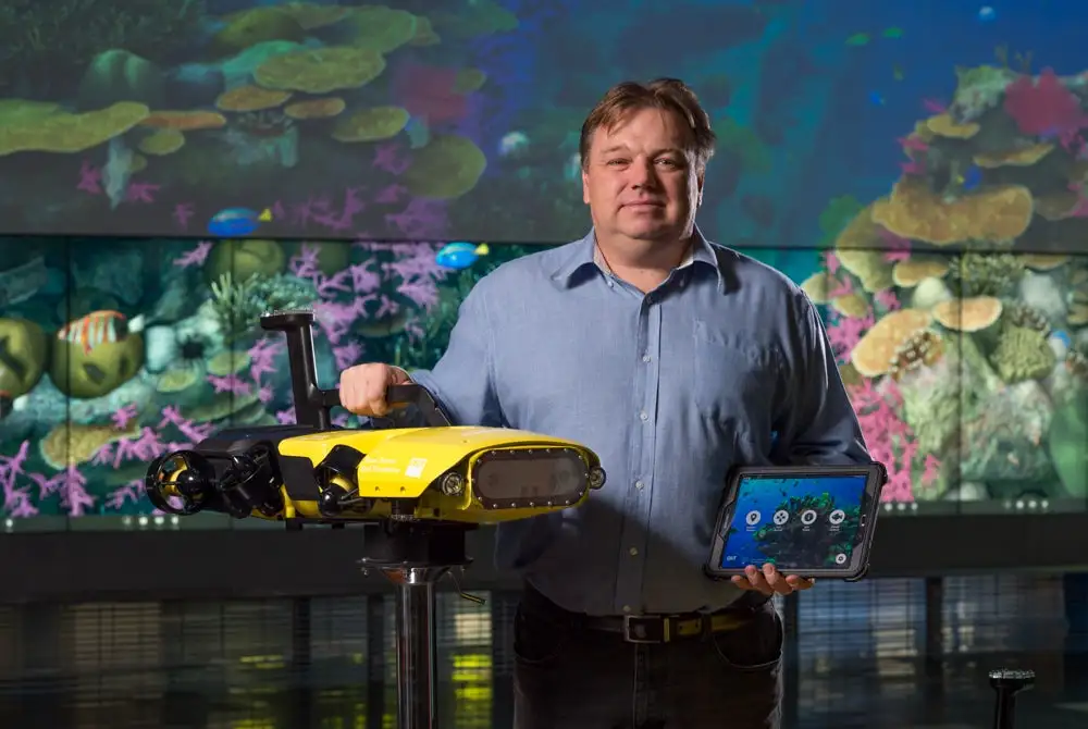 Queensland University of Technology's Professor Matt Dunbabin with his RangerBot