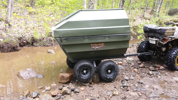 The Tetra-POD lid locks into place and opens with the assistance of gas springs