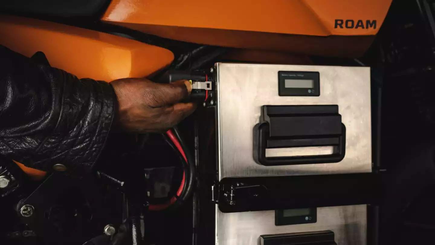 Is that a tiny padlock latch for the batteries? That ain't gonna cut it