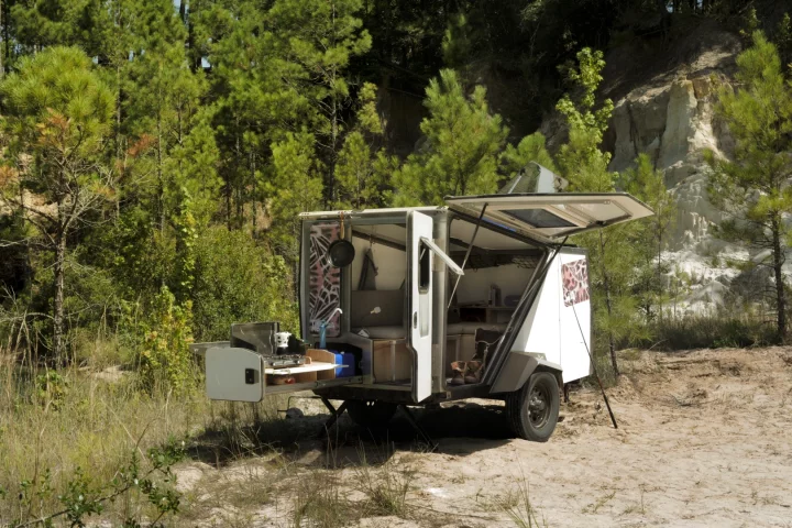 The under-coach slide-out can hold kitchen equipment or other gear