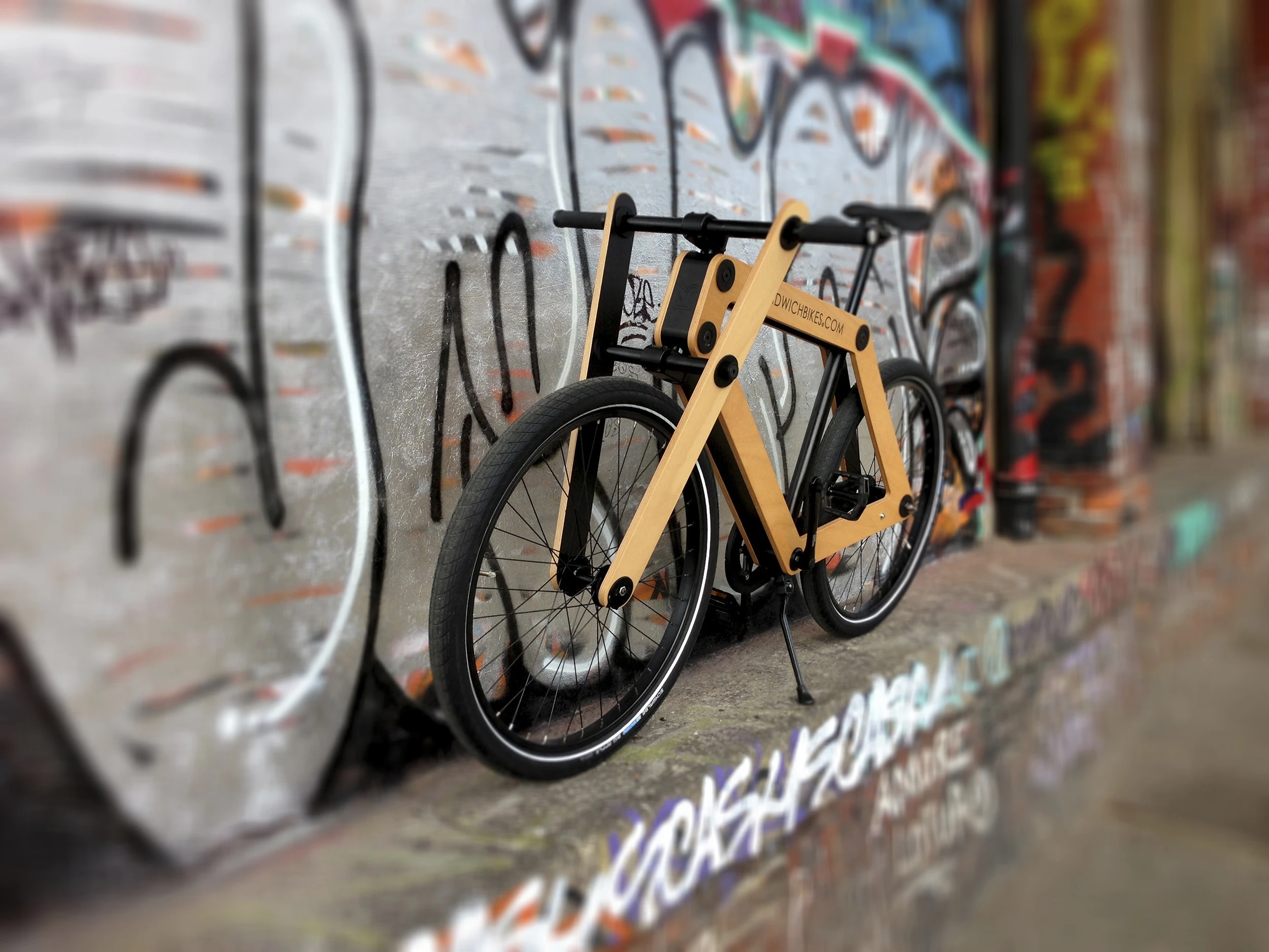 The wood-framed Sandwichbike is purchased flat-packed in a box, and is assembled by the buyer