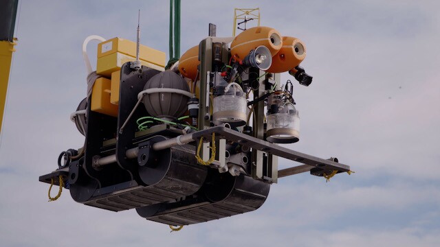 The Benthic Rover II measures 2.6 m long by 1.7 m wide by 1.5 m high (8.5 by 5.6 by 4.9 ft)