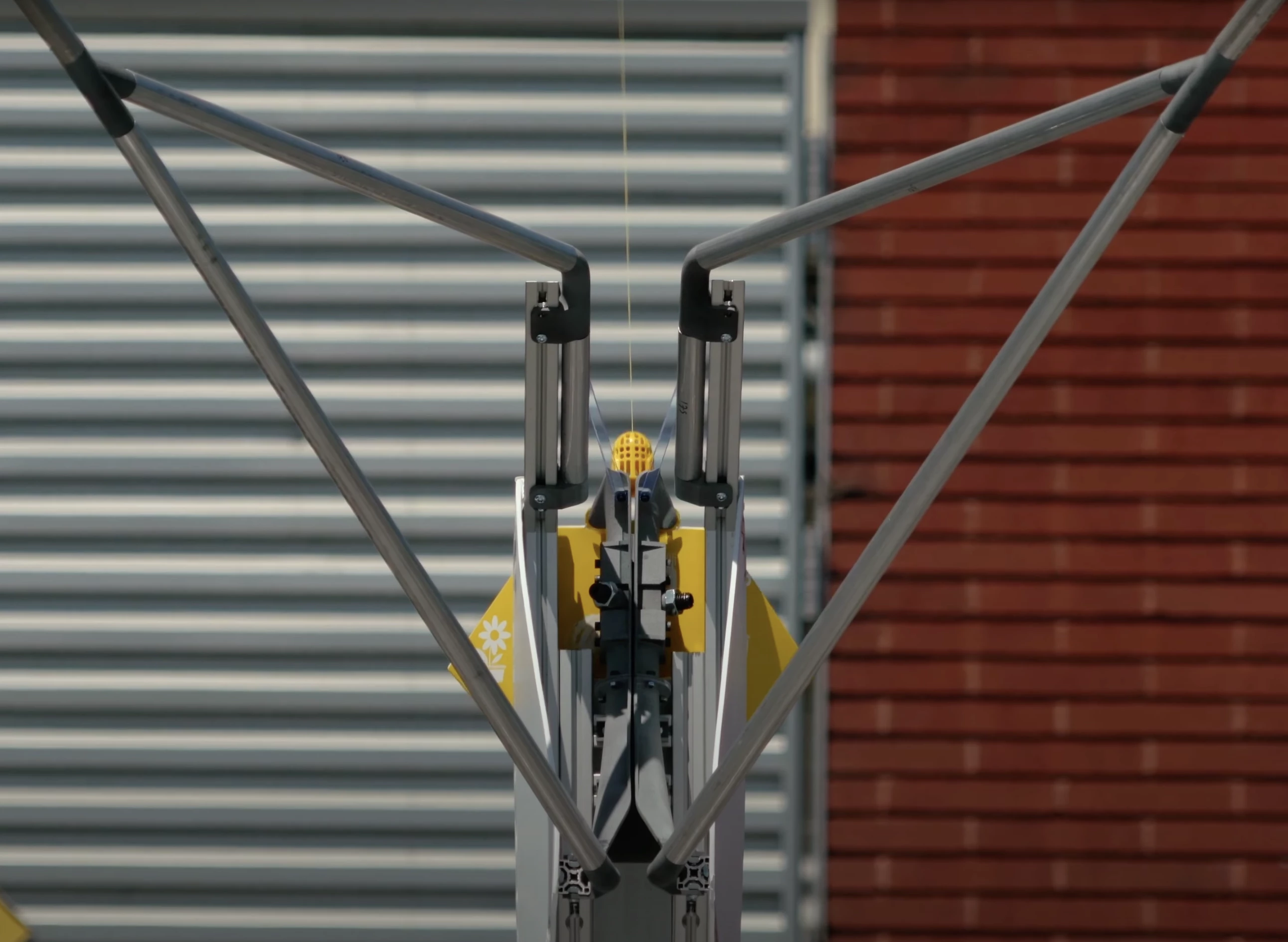 Wing's AutoLoaders save time for vendors, turning drone delivery pickups into an asynchronous and automated process