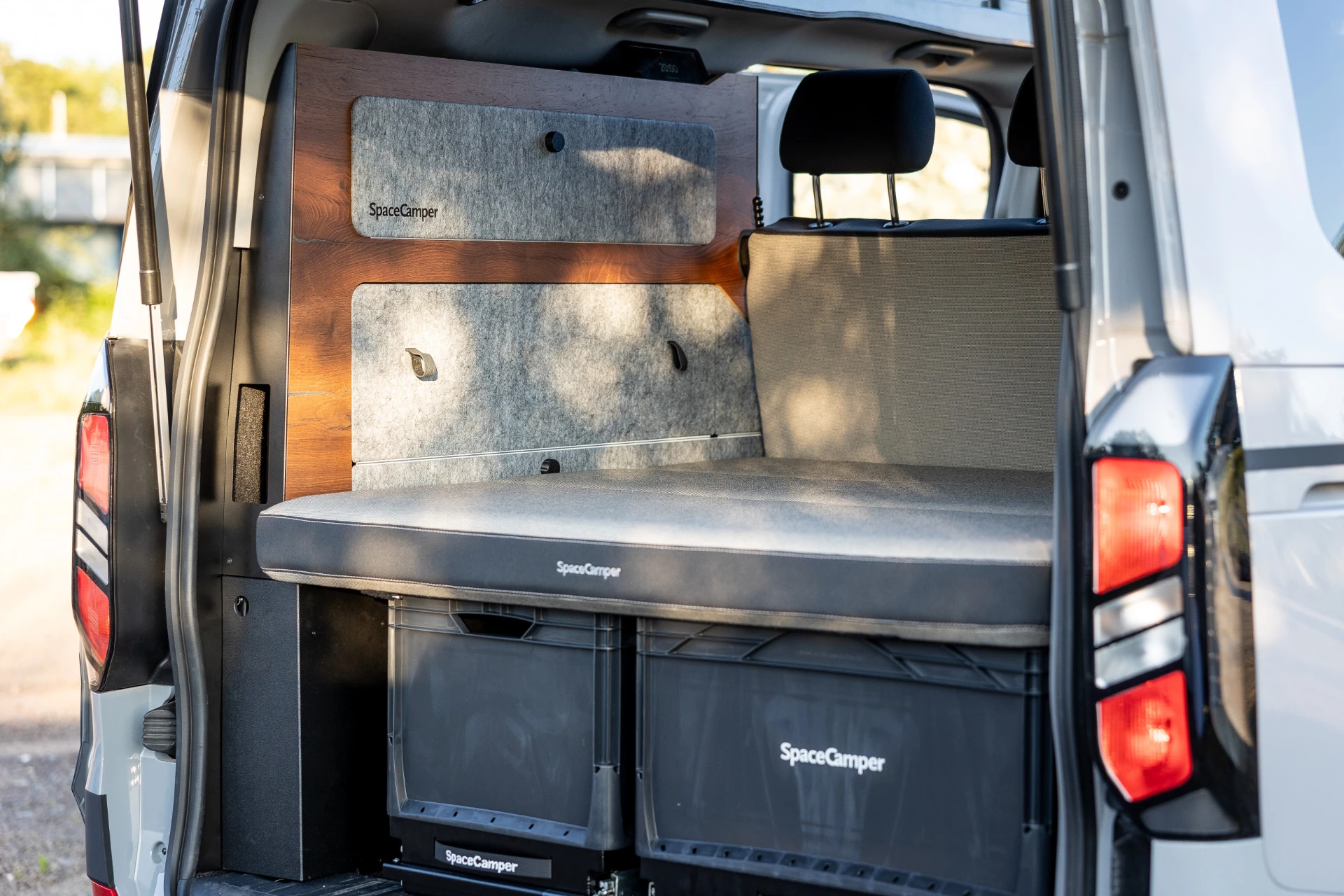 The Classic+ includes a full-height rear cabinet and under-bed slide-outs