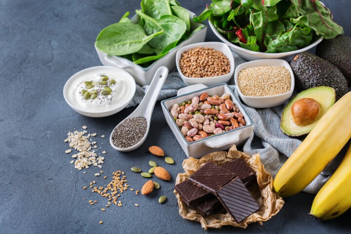 Nuts, seeds, dark leafy greens, and dark chocolate are all good dietary sources of magnesium
