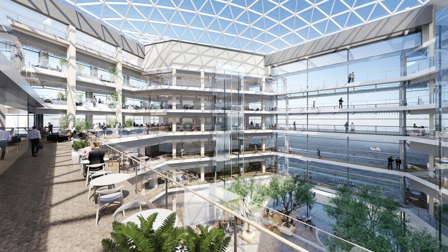 The use of glass allows the building to be filled with natural light and provides panoramic views from all six floors