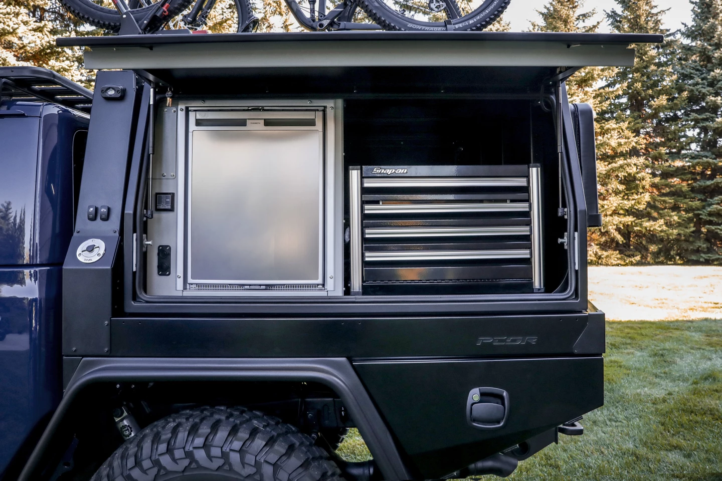 The hot dog roller might not be right for every pre-/post- mountain bike ride, but cold drinks in the electric fridge/freezer definitely will be