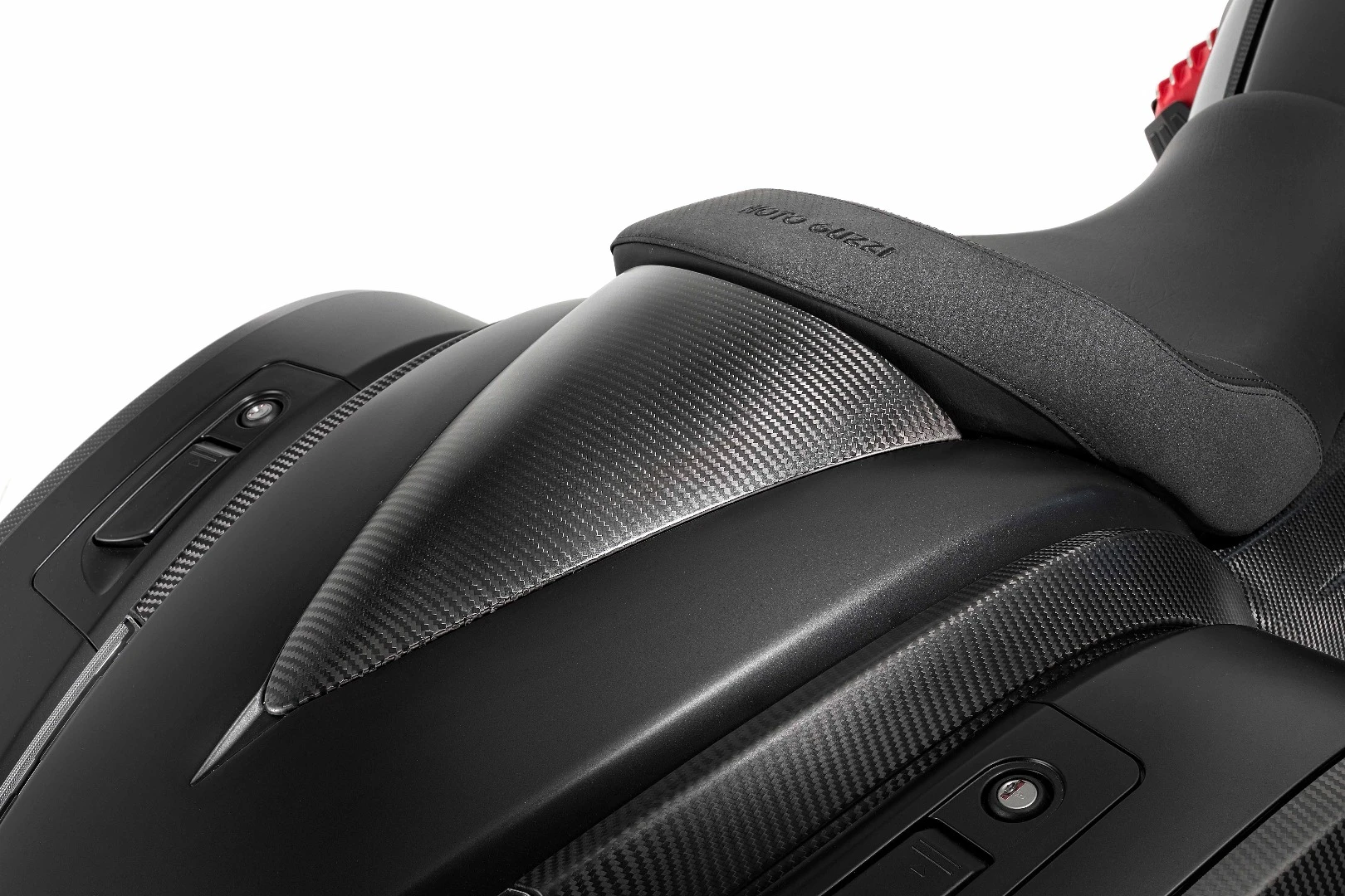 The passenger seat can be removed with the space covered by a carbon fiber accessory