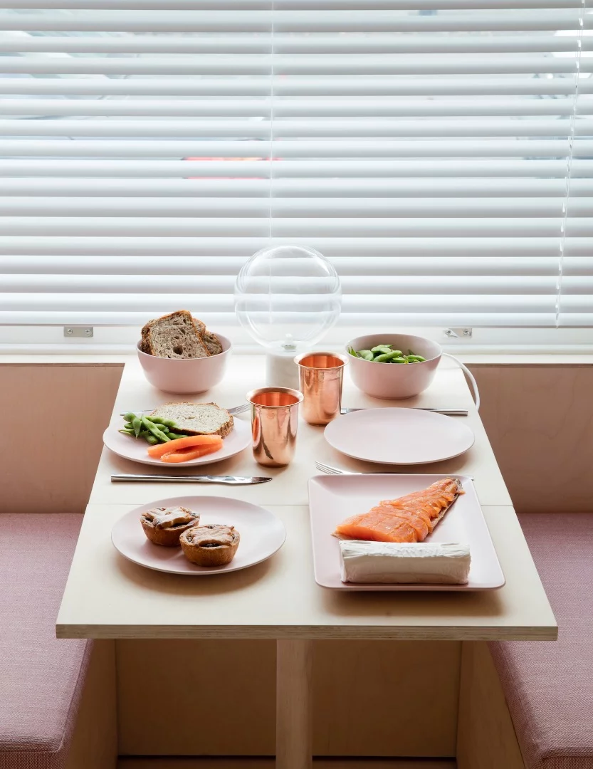 The 13 sq Metre House's dining booth extends in length when needed