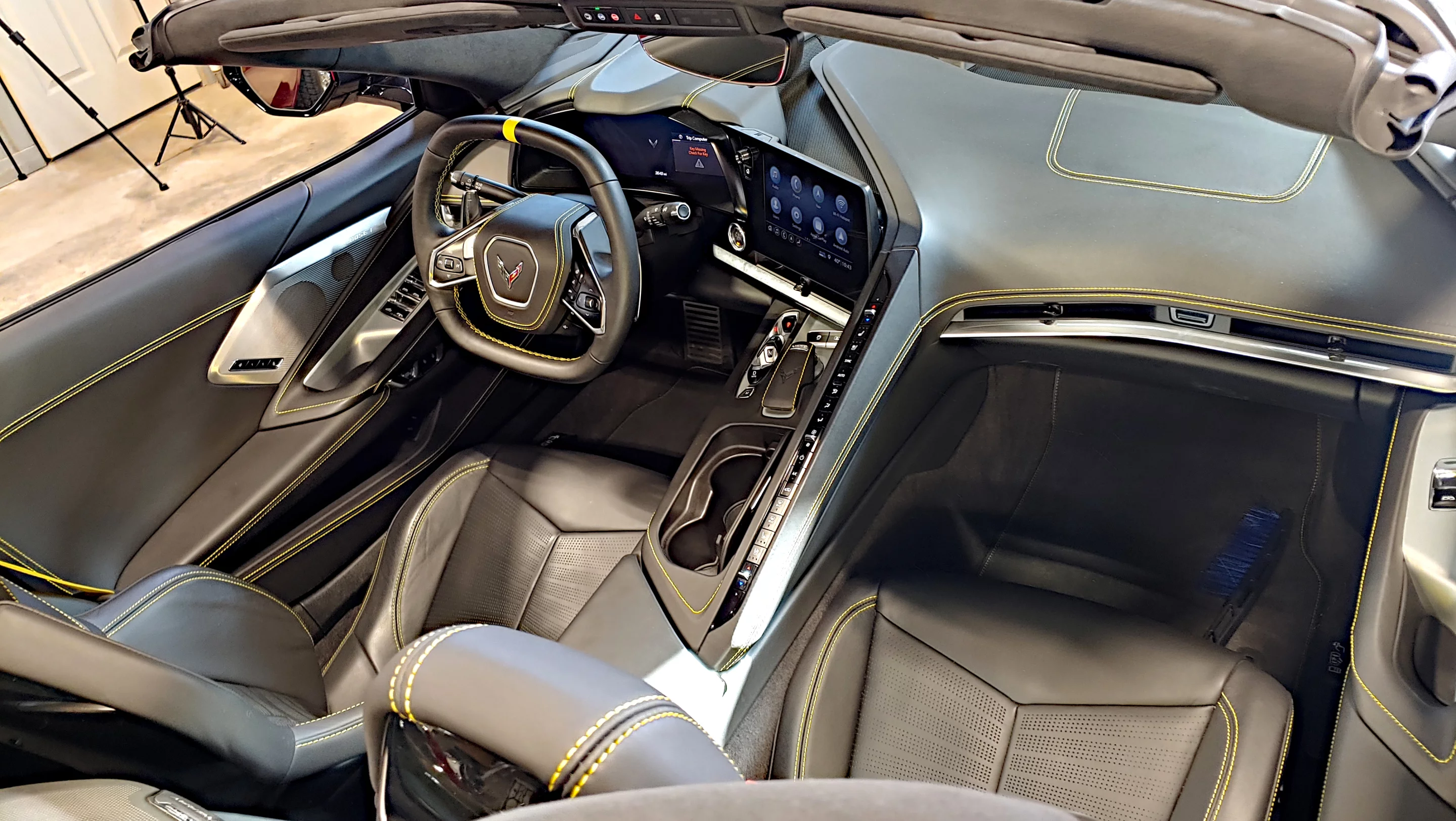 From the passenger's viewpoint, the buttons, infotainment, etc are all canted away in mystery