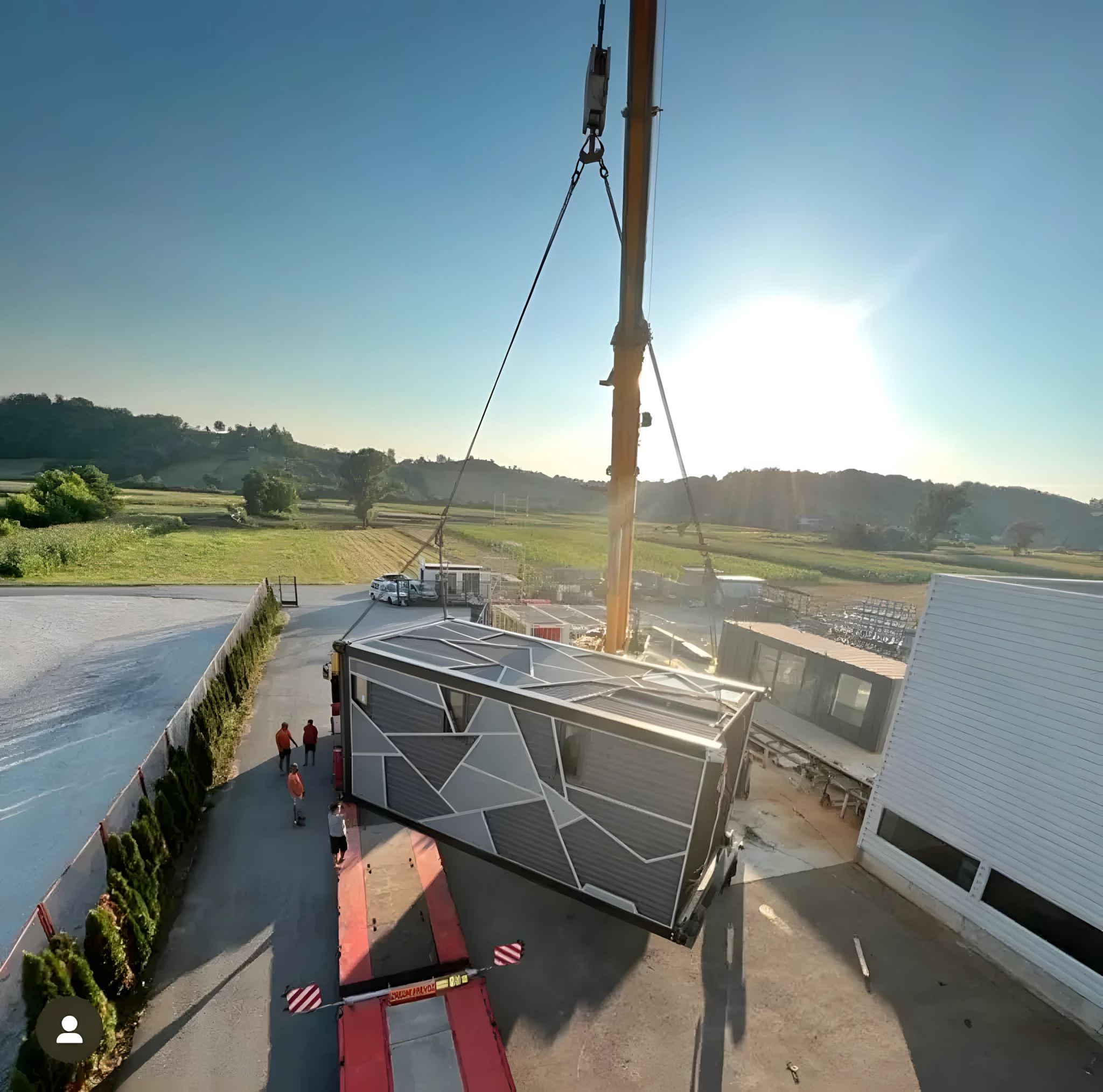 The DQ Tower is delivered by truck and installed using a crane