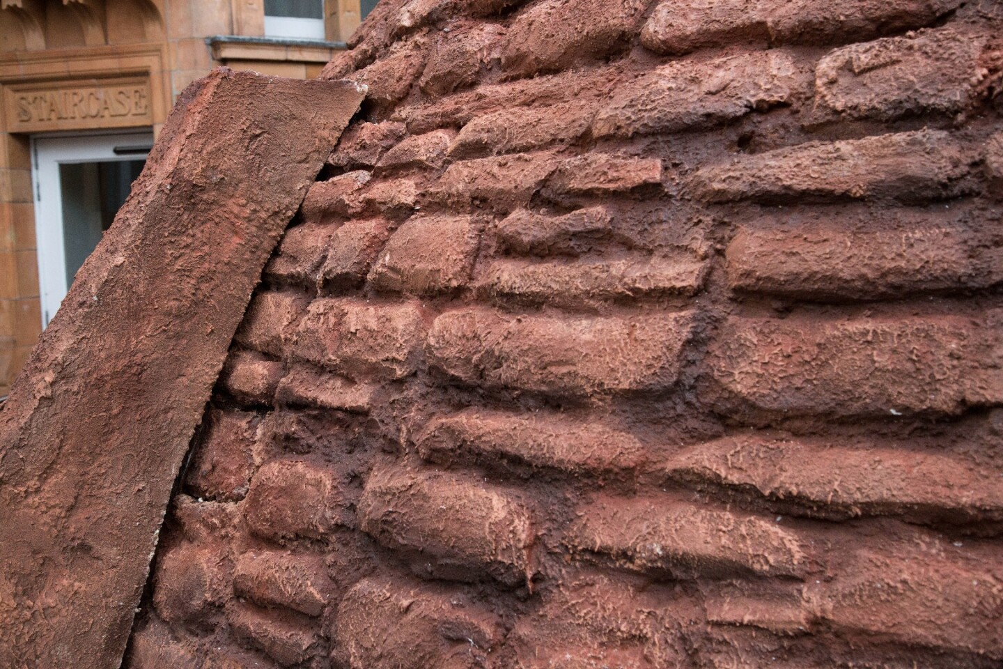 The show home suggests Mars homes would be built of martian-soil bricks and recycled spacecraft parts