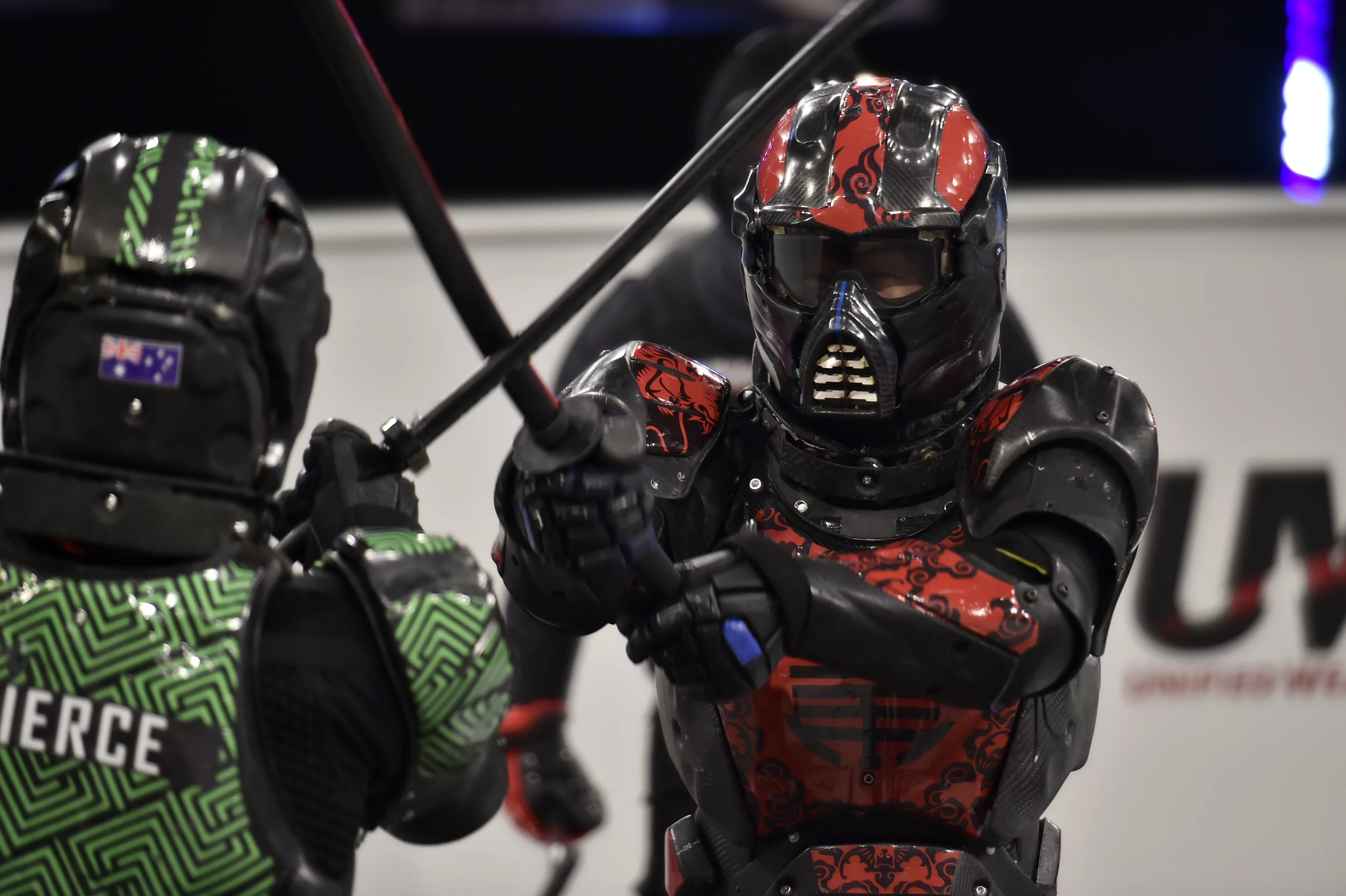 Fierce (L) vs War Demon in a sword fight at UWM's first underground event in Wellington, NZ