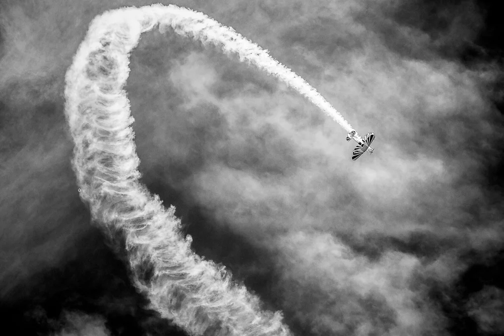 Nominee, Amateur, Open Theme. A study of stunt aircraft trails