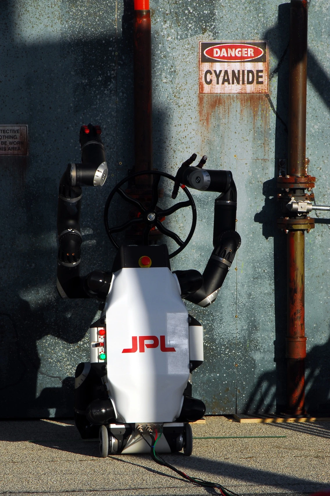 RoboSimian closing a valve