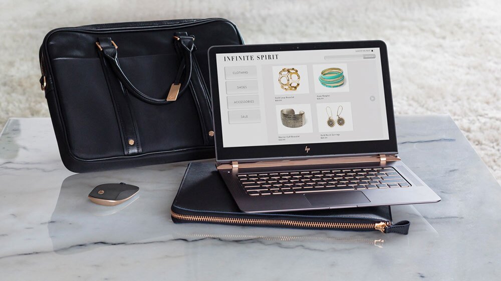 The Spectre is built from carbon fiber and aluminum with a black and copper color scheme