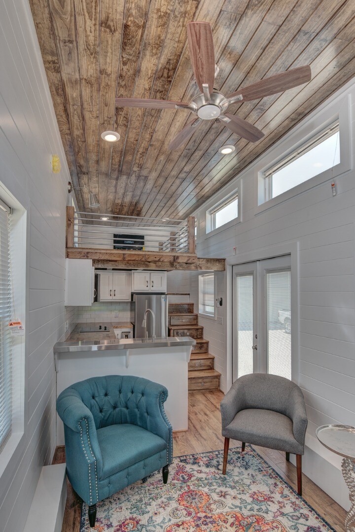 Luxurious tiny house squeezes in a loft with space to stand