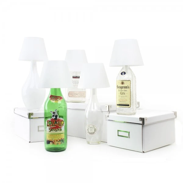 Different bottles complete the look of the Satechi Touch USB LED Lamp in different ways