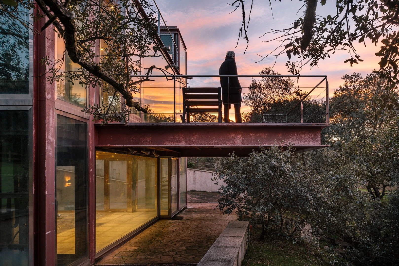 The Hidden Pavilion's veranda cantilevers over a waterfall