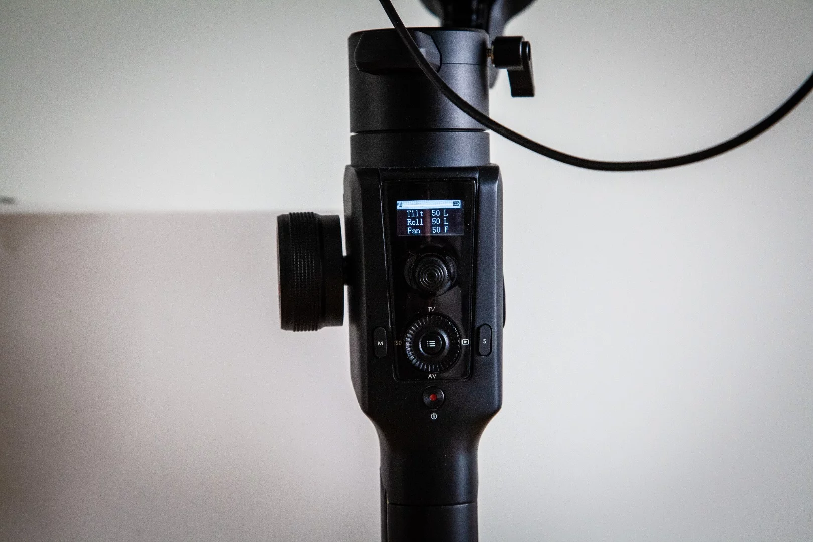 Thumb controls include a joystick, scroll wheel and several buttons