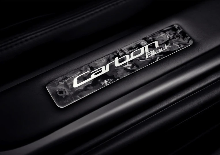 DB9 Carbon Black logo plate