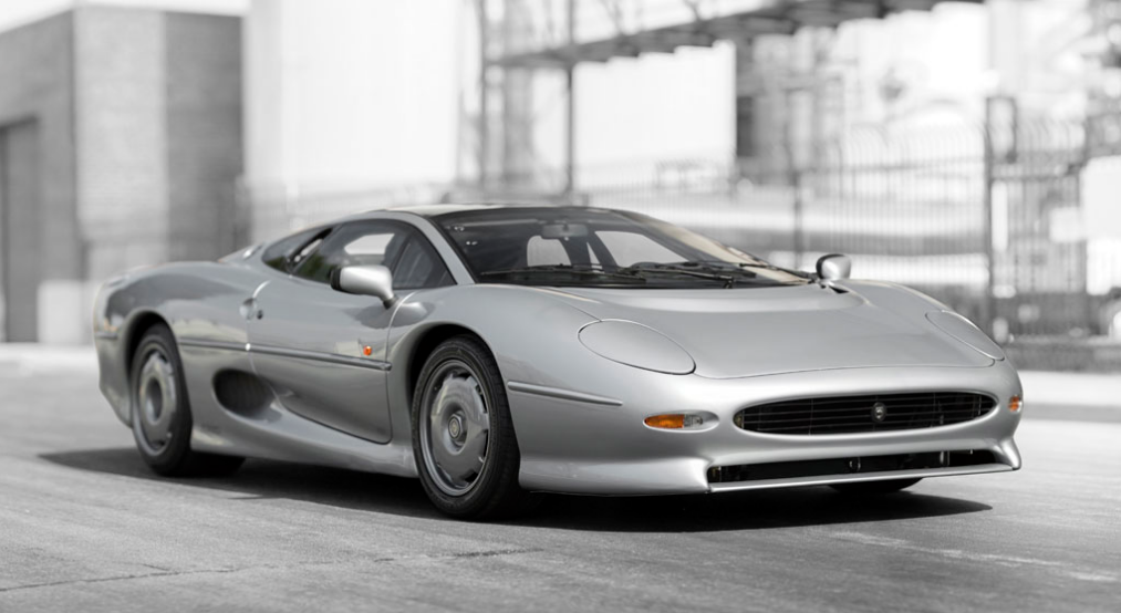 In 1988, the XJ220 concept was unveiled at the British International Motor Show with a V12 engine sending power to all four wheels, like the Porsche 959. Based on the overwhelmingly positive response it received, Jaguar started accepting pre-orders with a deposit of just £50,000 (about US$96,000 at the time). In the end, around 1,500 people laid down their cash, and delivery was slated for 1992. The production XJ220 was fitted with a 542 hp twin-turbocharged V6 in lieu of the V12 and the 4WD system went the same way. The XJ220, as the name suggests, had been targeted at a 220 mph (354 km/h) top speed, though the best it achieved under clinical conditions was 217 mph (349 km/h) on the circular Nardo circuit in Italy. When the McLaren F1 ran 231 mph (372 km/h) in 1993, the Jaguar XJ220 quickly became old news, but aficionados are still getting a bargain basement investment, as the XJ220 was a fantastic car and held the Nürburgring Nordschleife production lap record until 2000 (7:46.36).