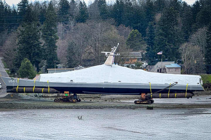Image (extended using generative tools) of the Defiant being towed for launch
