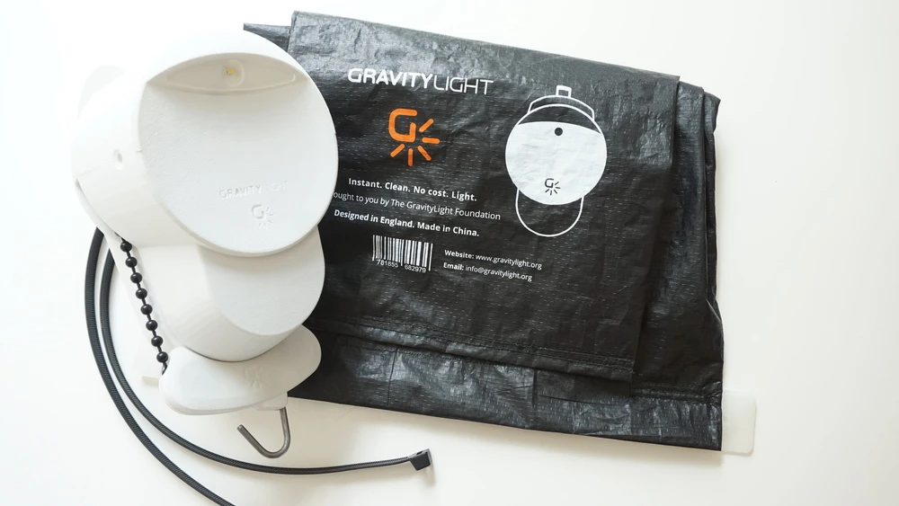 The new version of the GravityLight features a new pulley system for ease of use, and has a more robust design than the original