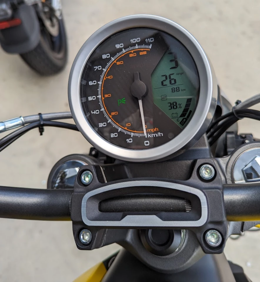 Dash is basic, with an analog speedo
