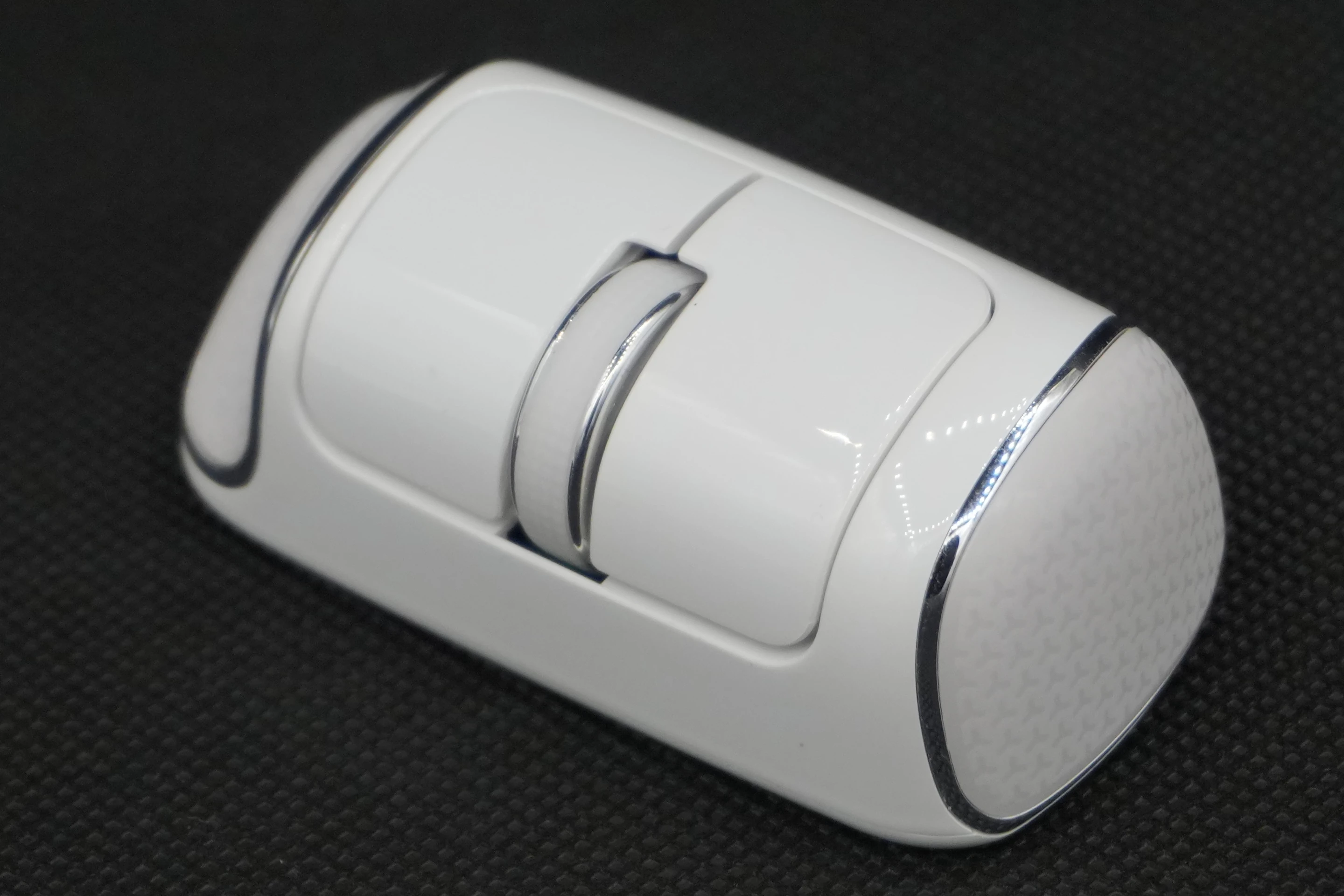 The mouse is available in color choices of black and white