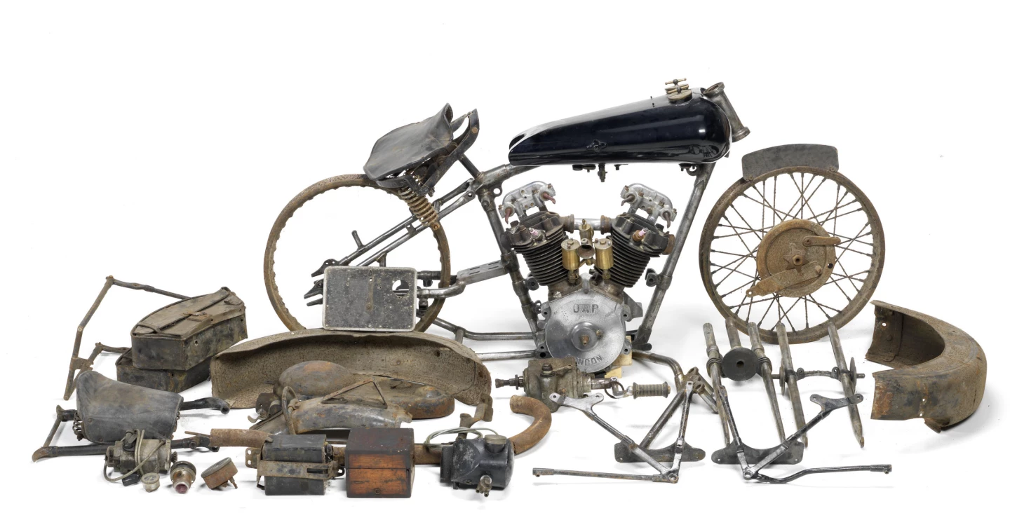 This 1930 Brough Superior Overhead 680 was purchased by the vendor's deceased father over 45 years ago, at which time it was complete although requiring restoration; indeed, the deceased owner's son recalls the Brough as complete some 40 years ago. Some work was done after dismantling the machine, including stripping the frame of paint, removing the valves and guides from the cylinder heads, and a repair to the front cylinder barrel. Fortunately, there were few missing parts other than the silencers (which had probably rusted away) and the dynamo. The starting point for this basketcase restoration fetched GBP£59,740 ($95,617) in October, 2012.