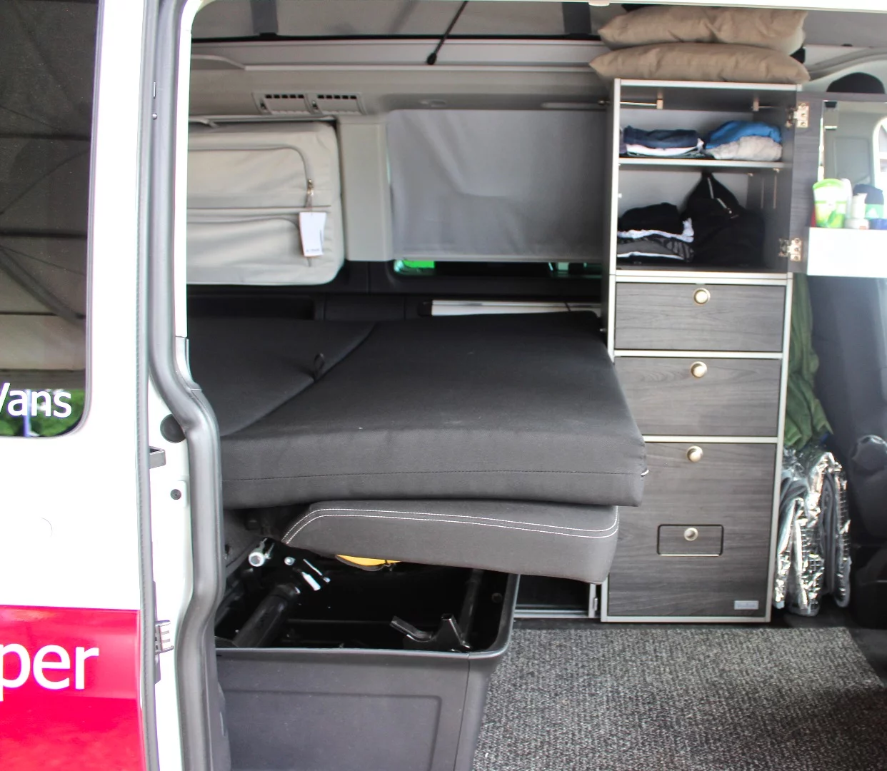 A look inside VanEssa's VW camper van. VanEssa specializes in removable camper modules and solutions for vans and trucks from numerous manufacturers