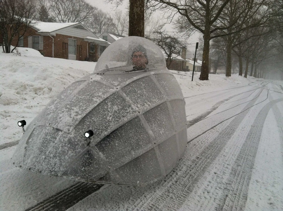 The FireFly is a recumbent tricycle outfitted with an LED-lit dome that keeps the rider visible and protected from the elements